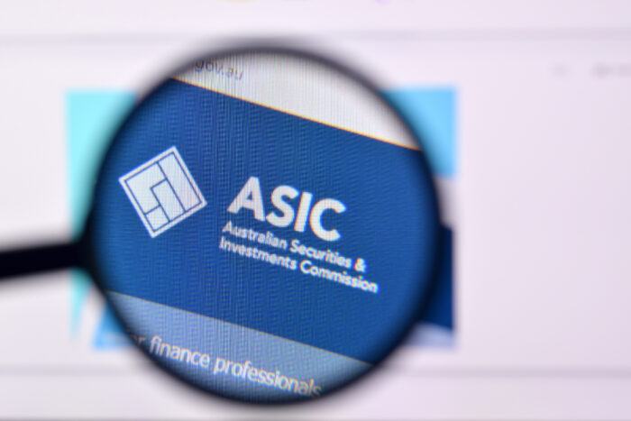 Homepage of asic website on the display of PC, url - asic.gov.au. magnifying glass hovering over ASIC logo and company name